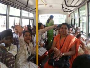 Students ready in the bus for field trip!