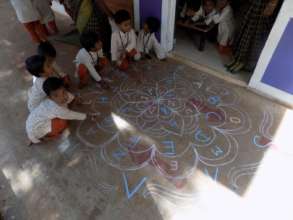 Alphabets on Rangoli!
