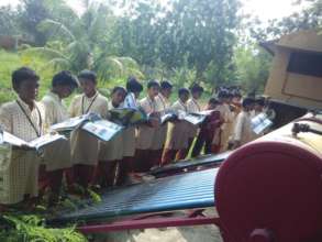 Students learn near the solar plant - 2
