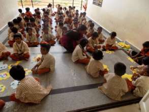 Students wait for their turn for activity