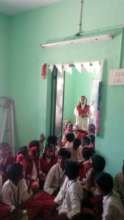Students asking questions to the Panchayat Head