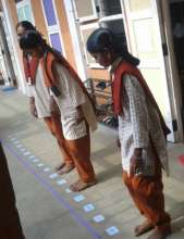 Students attempting with the aid of the scale