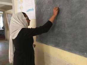 Salma working out an algebra problem