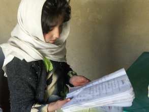 AAE student celebrating International Literacy Day