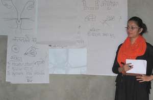Aditi, from our partner Nidan, teaching the women