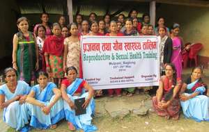 Saraswati (in green, behind sign) w/ Baglung group