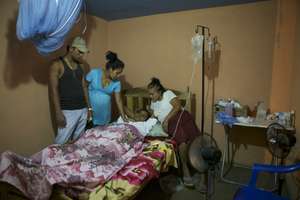 Patient and surrounded by his family