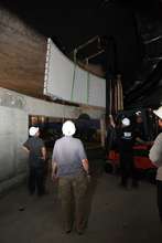 The first aquarium tank window panel is installed