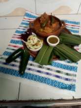 Tamalitos with spicy soup and salad