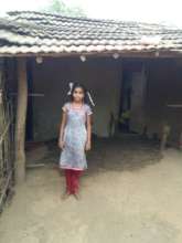 Girls infront of her homes