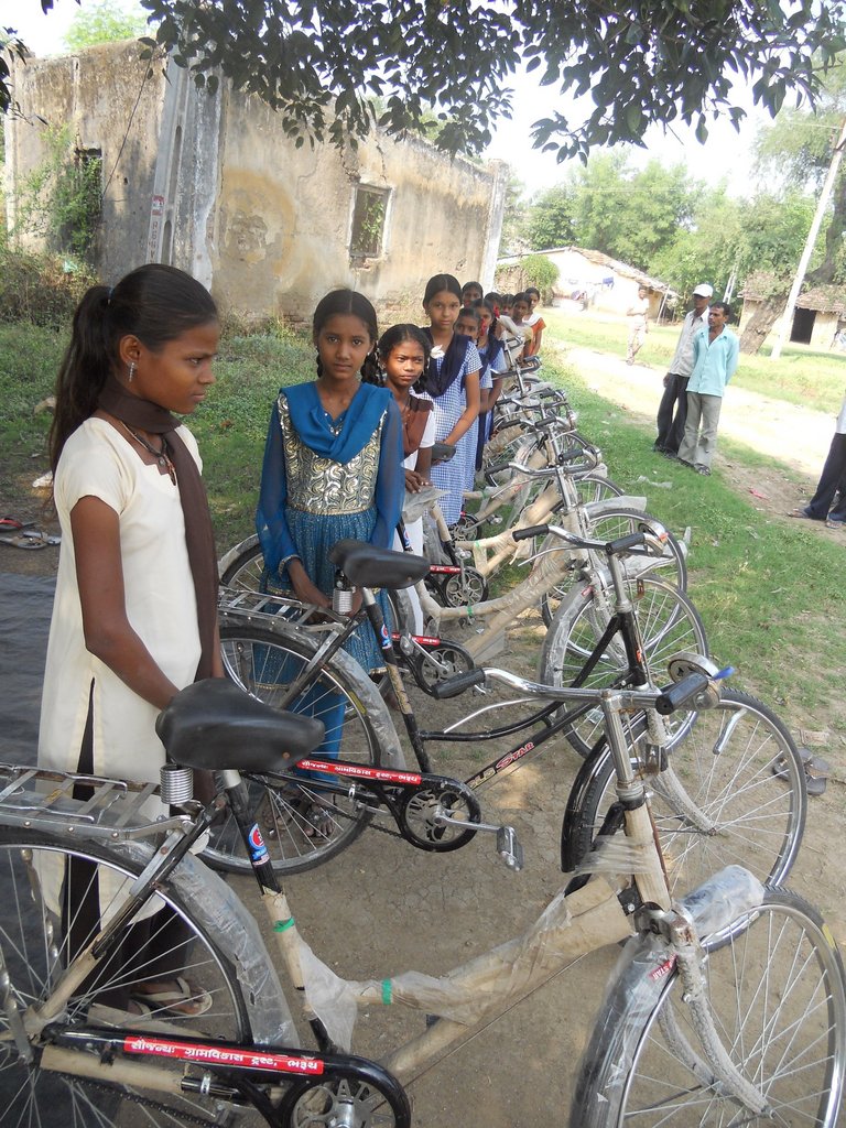 Give A Girl A Bicycle - Help Her To Go School