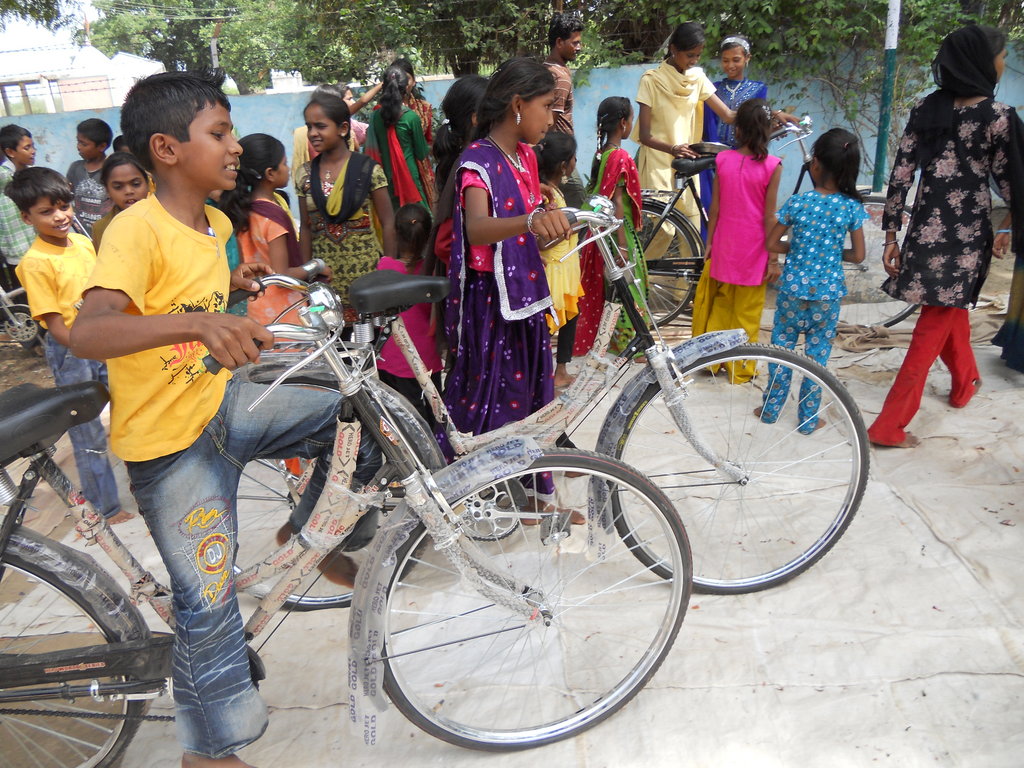 Give A Girl A Bicycle - Help Her To Go School