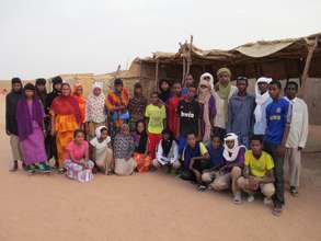 RAIN Staff Halima Aboubacar with students.