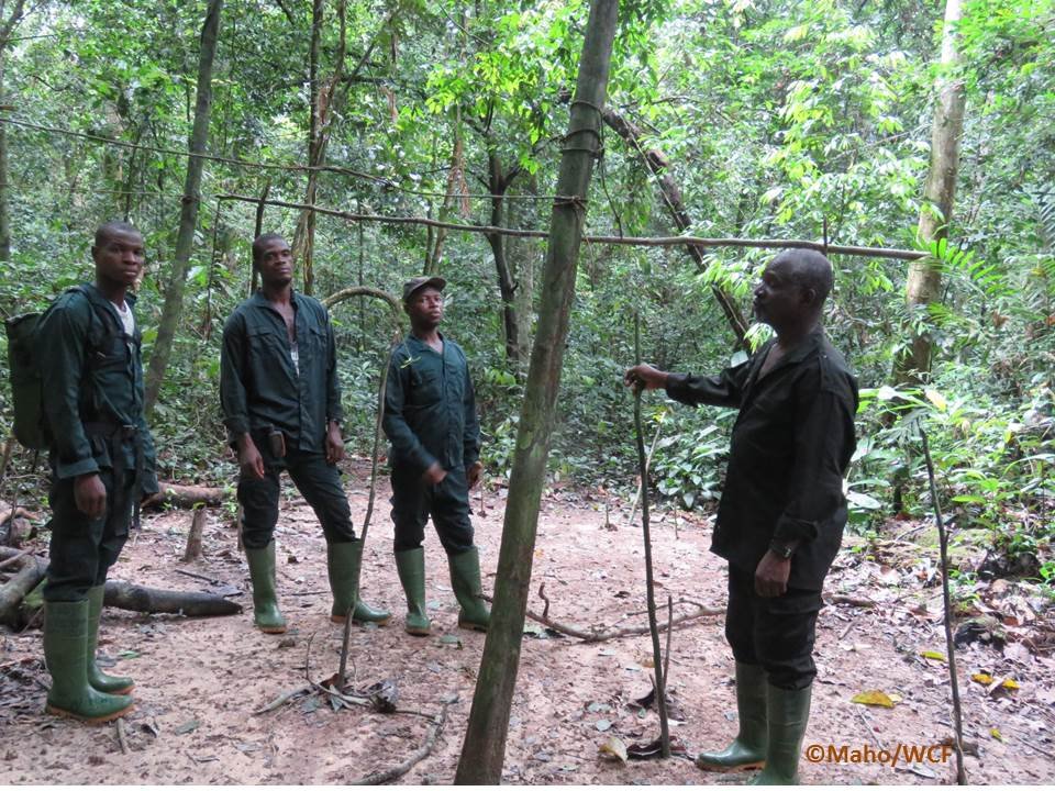 Anti-poaching team discovering a poacher camp