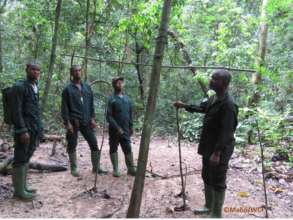 Anti-poaching team discovering a poacher camp