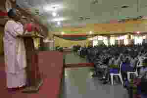 Principal Addressing Students at the Symposium