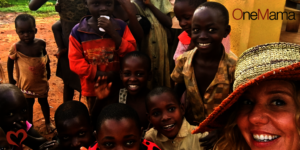 OneMama Founder with the local families at Clinic