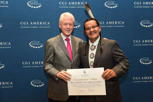 Henry Red Cloud with President Clinton at CGI