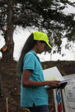 Youth Manager Utsa Parikh goes over speech notes