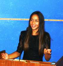 Youth Manager Lina speaking at public event