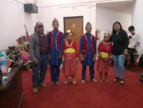 Children posing after the dance