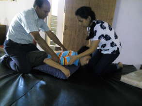 New physiotherapist in action