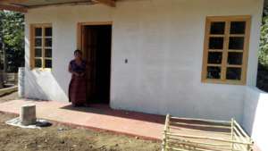 Bajareque home with floor extending into to porch