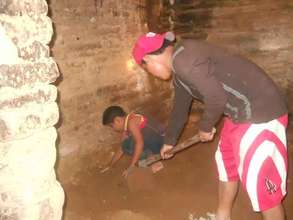 Family prepares the floor for replacement