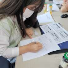 A student filling career path worksheet