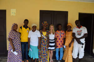 The three students with their proud parents.