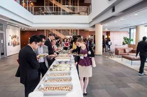 Delegates eating a catered meal after the session