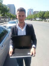 Library Assistant with the new laptop.