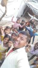 Rahul with children from his native village