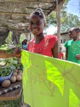 Student displays her artwork for the festival