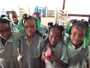 Four young girls of St Paul's at lunch
