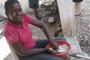 Grinding corn for hot lunch