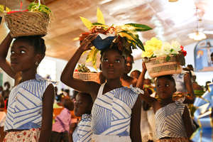 School Youth Bring Gifts in Celebration