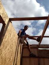 Felipe building a roof...