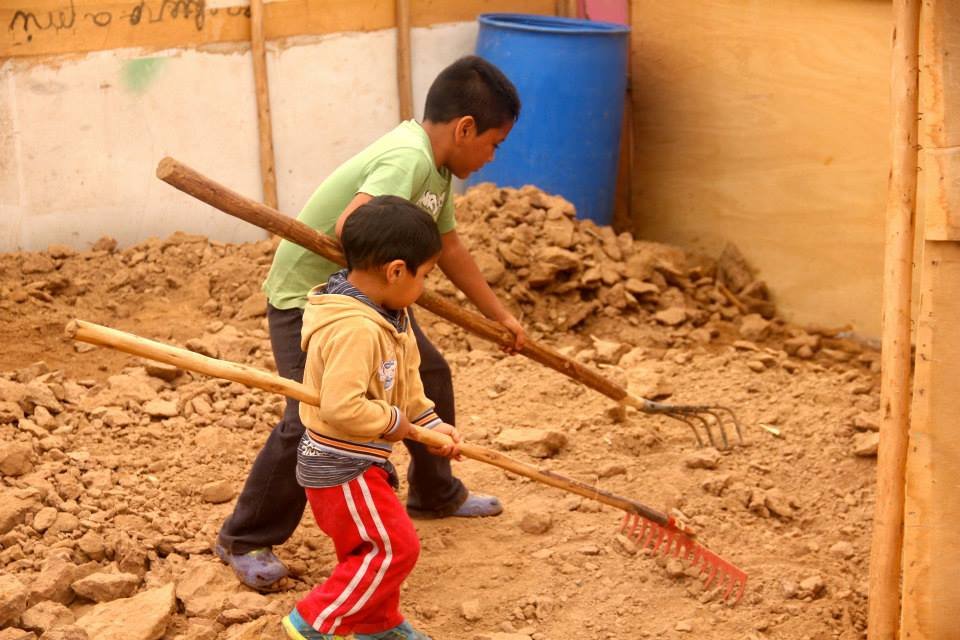 The kids trying to give us a hand!