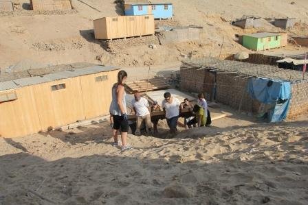 Build homes for families living in extreme poverty