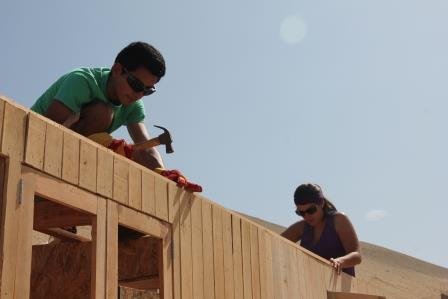 Build homes for families living in extreme poverty