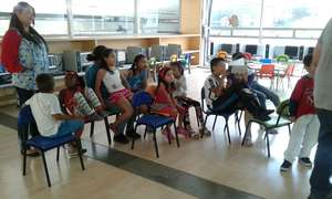 Kids learning together at the library