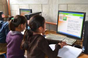 Students using computers to study biology