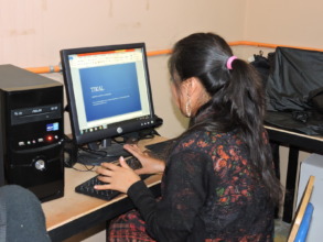 Students learning computer skills