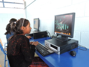 Aura in the new computer lab at San Bartolome