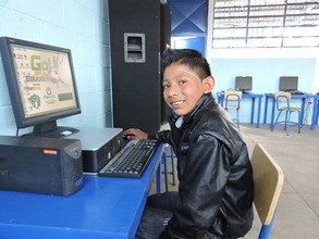Henry enjoying his time at the computer