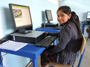 Maribel learning new software at San Bartolome