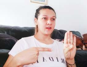 Naty, the teacher showing an evercise
