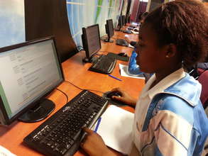 Grade 6 pupil completing her weekly online lesson