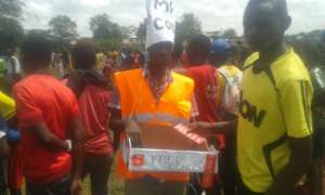 Mr. Condom distributing condoms